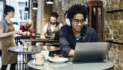 People working remotely from coffee shop