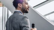 man speaking at a business event