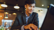 business man in front of a computer terminal