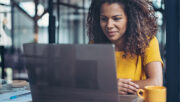 Photo of a business woman using a laptop